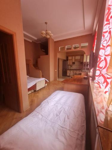 En eller flere senge i et værelse på Центр, Євгена Коновальця, 3