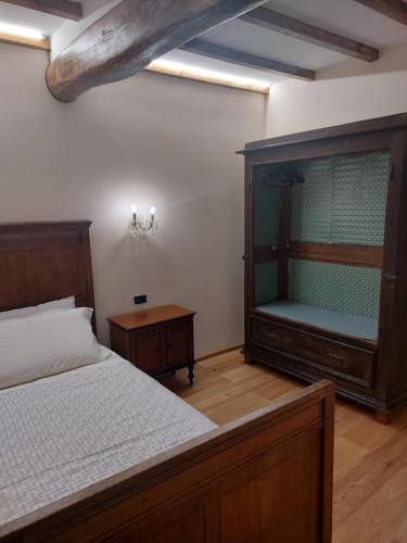 Postel nebo postele na pokoji v ubytování B&B Donnini Firenzuola