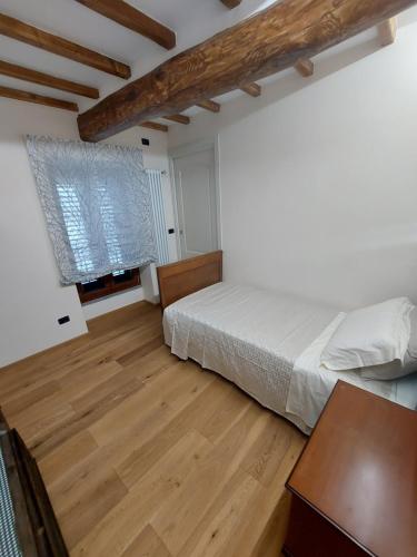 Postel nebo postele na pokoji v ubytování B&B Donnini Firenzuola