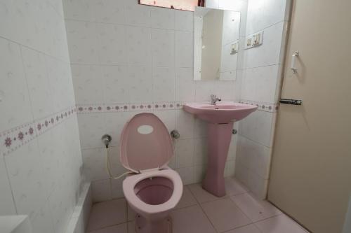 Ένα μπάνιο στο HomeSlice Nazaara, HomeStay in BTM