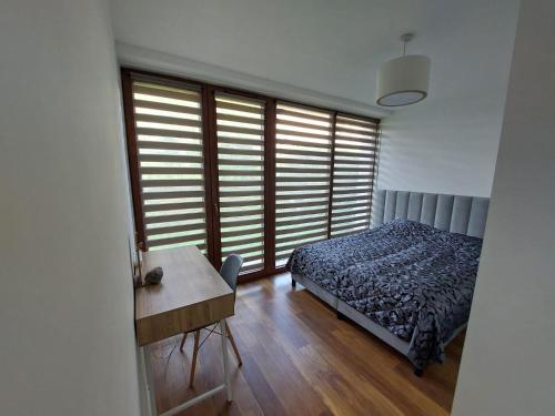 Posteľ alebo postele v izbe v ubytovaní Apartament Reformacka