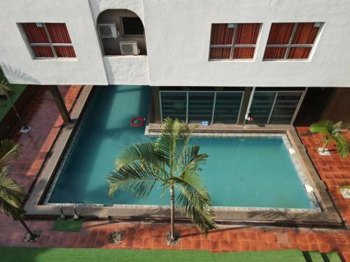 an overhead view of a swimming pool in a house at Kakanfo Inn & Conference Centre in Ibadan