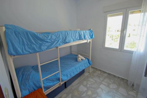 Кровать или кровати в номере Marlene - private pool villa with sea views from the rooftop in Calpe