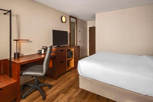 Ένα ή περισσότερα κρεβάτια σε δωμάτιο στο Comfort Inn