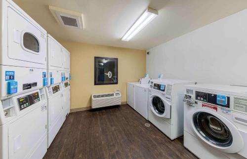 a laundry room with a washer and dryer at Extended Stay America Suites - Los Angeles - Arcadia in Arcadia