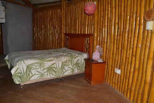 Lova arba lovos apgyvendinimo įstaigoje Casa de bambú en armonía con el medio ambiente