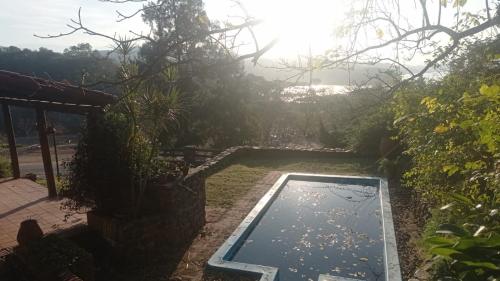 a swimming pool in the yard of a house at Casa Gelsi - El Cadillal in Tafí Viejo