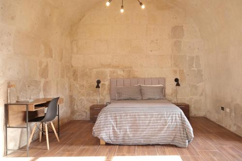 Tempat tidur dalam kamar di Estancia El Solar