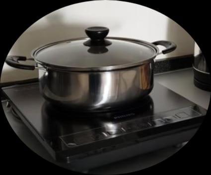 a pot sitting on top of a stove at Landmark Lovely Coast View King Suite#500mbpsWifi#Netflix in Tanjong Tokong