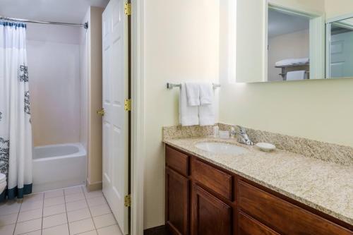 a bathroom with a sink and a shower at Residence Inn Charlotte SouthPark in Charlotte