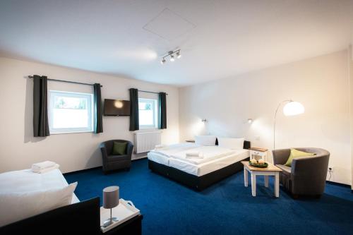 Una cama o camas en una habitación de Arcade Hotel & Hostel Hamburg