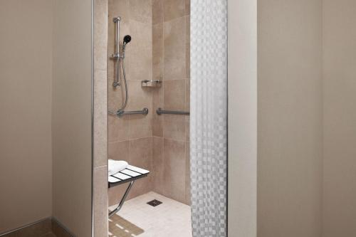 a bathroom with a shower with a glass door at Westin Georgetown, Washington D.C. in Washington