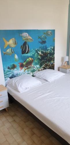 Posteľ alebo postele v izbe v ubytovaní la Marine