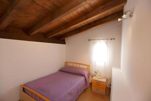 En eller flere senger på et rom på Aretusa Girgenti Home
