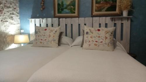 Ένα ή περισσότερα κρεβάτια σε δωμάτιο στο Habitación en Ocaña