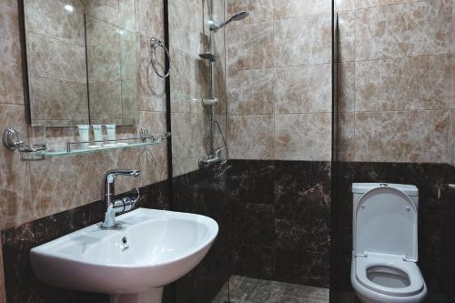 Ein Badezimmer in der Unterkunft ALOFT