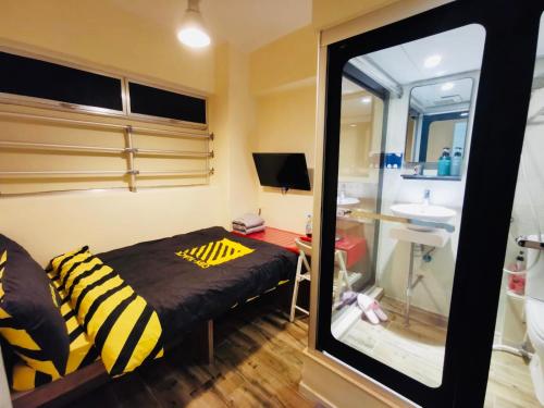 Koupelna v ubytování 香港九巴旅馆 KMB-Guesthouse