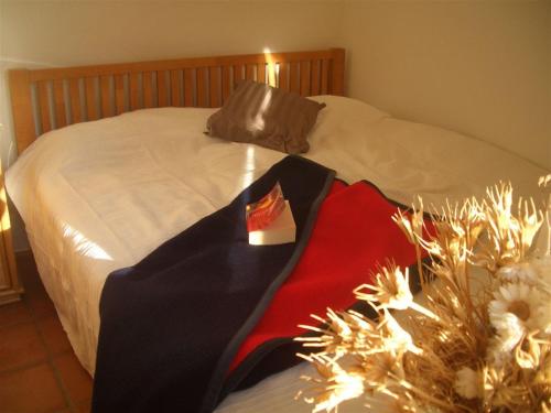 Postel nebo postele na pokoji v ubytování Wohnen am Noor