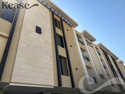 a building with the letter b on it at Kease Malqa B-4 Royal Touch AZ31 in Riyadh