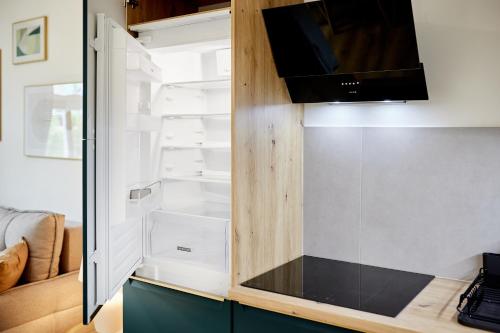Телевизор и/или развлекательный центр в Residence 44