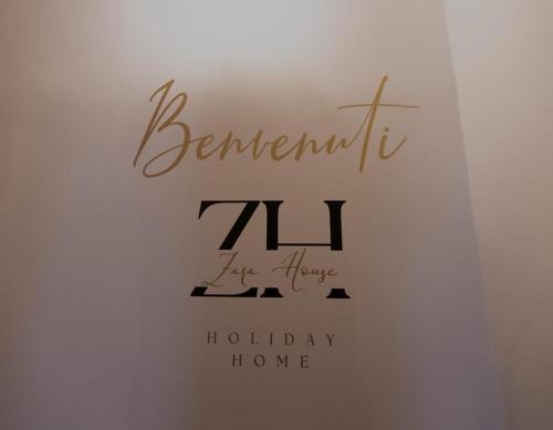 a sign with the words benjamin vi ah on a wall at Zara House Holiday Home in Palmi