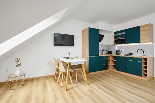 Кухня или мини-кухня в Residence 44
