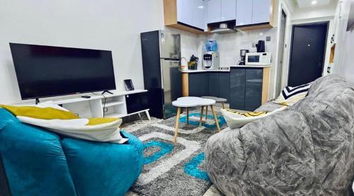 TV in/ali zabaviščno središče v nastanitvi Kilimani cosy One Bedroom