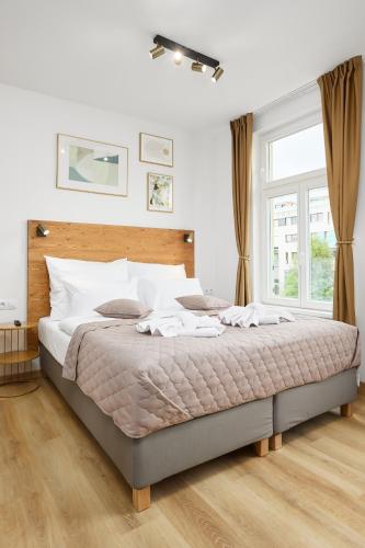 Кровать или кровати в номере Residence 44