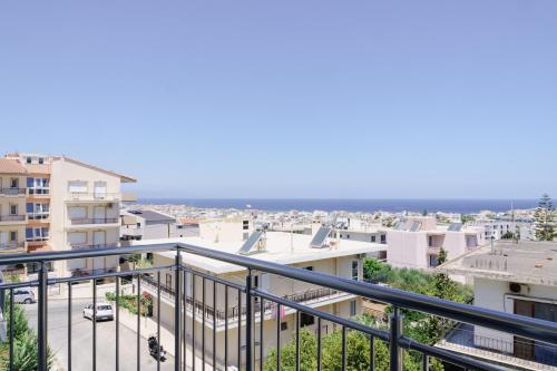 a view of the city from the balcony of a apartment at EDEL Luxury Apartments in Chania Town
