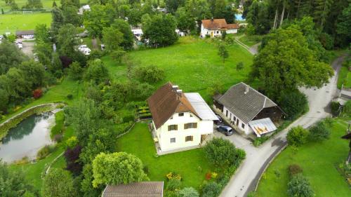 an aerial view of a house and a river at Unterm Nussbaum 2 in Rassing