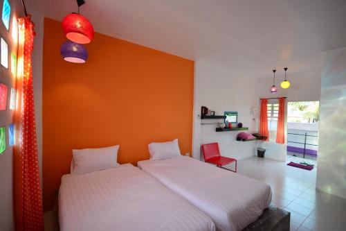 Säng eller sängar i ett rum på Na-Rak-O Resort