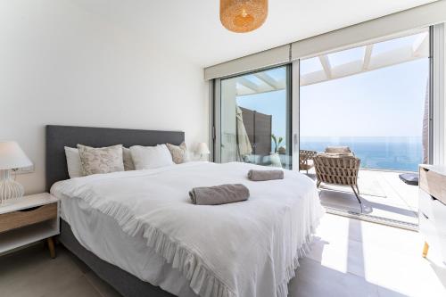 Katil atau katil-katil dalam bilik di Luxury Penthouse with Rooftop