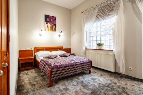 Una cama o camas en una habitación de Gotyk
