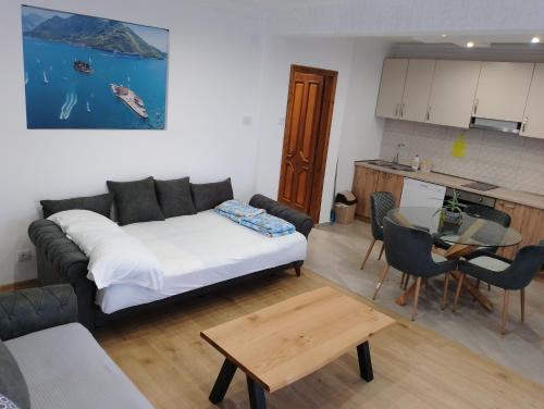 Et opholdsområde på Apartment Ksenija