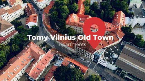 an image of a city with the words tony vitidis old town and apartments at Tomy Old Town Apartments in Vilnius