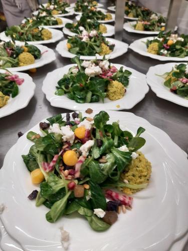 a row of plates of food on a table at Gasthof Hotel zur Post in Egloffstein