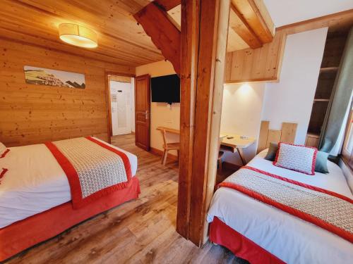 Katil atau katil-katil dalam bilik di Hôtel Le Sporting