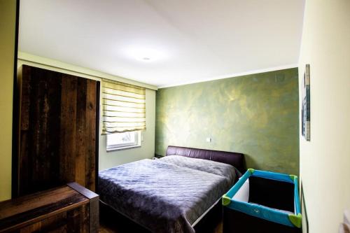 Postel nebo postele na pokoji v ubytování Ferienwohnung in Feldkirchen Dagmar und Christian!
