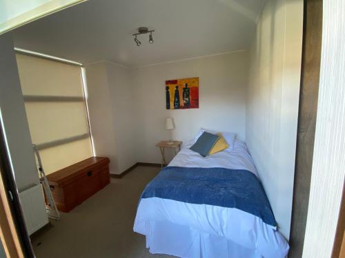 Una cama o camas en una habitación de Departamento Costa Pucon 33