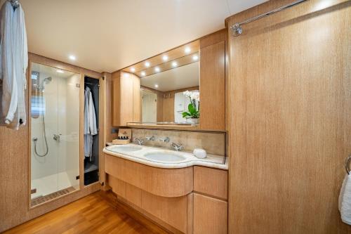 a bathroom with a sink and a shower at M/Y Opera in Sami