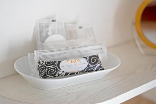 a box of antena sitting on a table at Mini Suite Deluxe Isola di Mezzo in Treviso