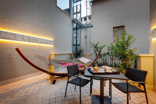 Χώρος καθιστικού στο Singer Palace Hotel Roma