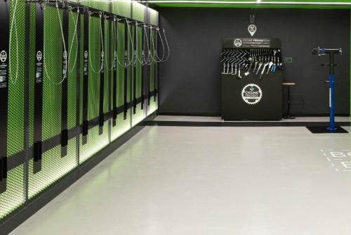 a locker room with a bunch of skis at Hotel Los Delfines in La Manga del Mar Menor
