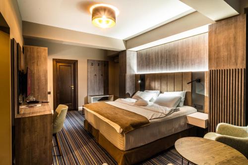 Un ou plusieurs lits dans un hébergement de l'établissement Hotel Anna