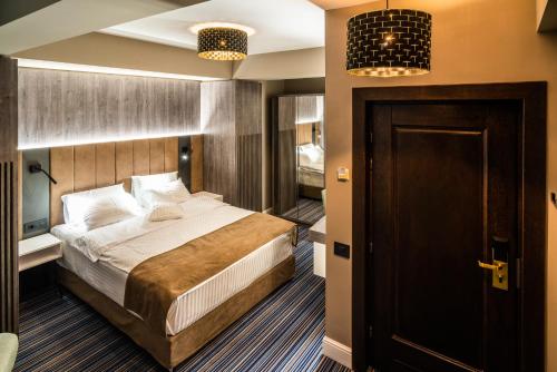 Un ou plusieurs lits dans un hébergement de l'établissement Hotel Anna