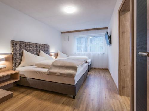 Postel nebo postele na pokoji v ubytování Apartment Montec Apart 2 by Interhome