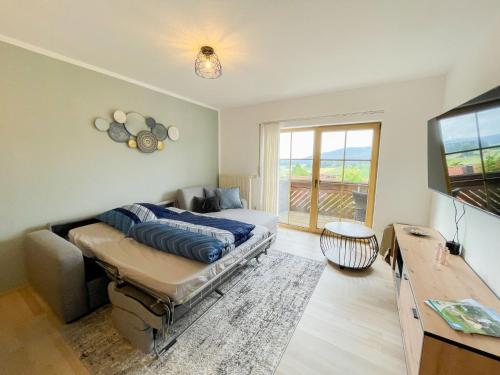 Ένα ή περισσότερα κρεβάτια σε δωμάτιο στο Apartment ReMaWe by Interhome