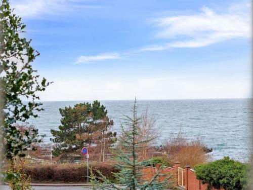a view of the ocean from a house at Apartment Erich - 200m from the sea in Bornholm by Interhome in Hasle