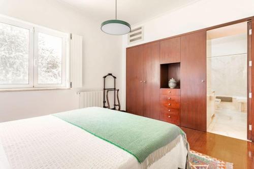 Katil atau katil-katil dalam bilik di Casal das Aveleiras