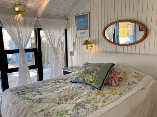 Postel nebo postele na pokoji v ubytování Holiday Home Ilenia - 150m from the sea in NE Jutland by Interhome